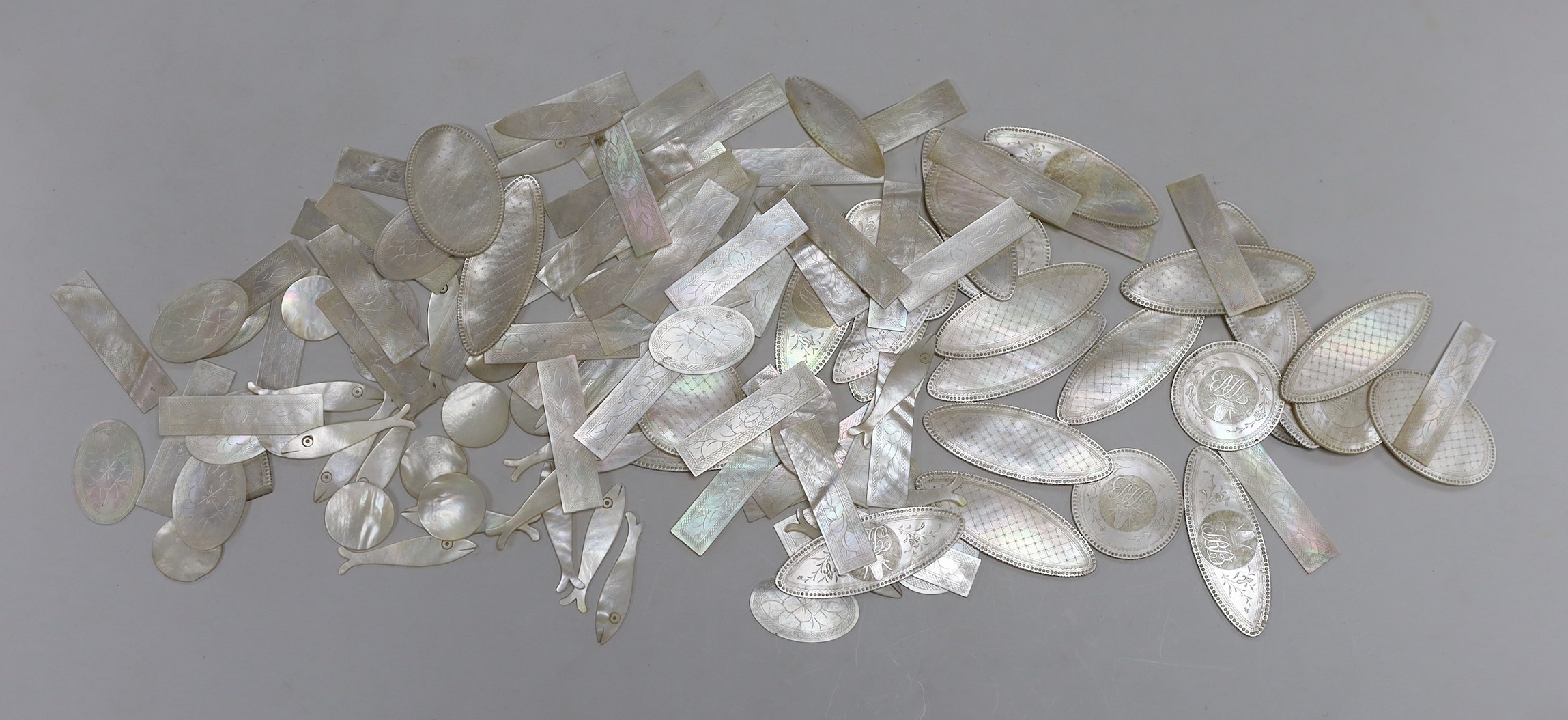 A box of Chinese mother of pearl gaming counters including crested examples with JRB monogram